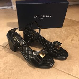 Black patent leather Cole Haan stack heel